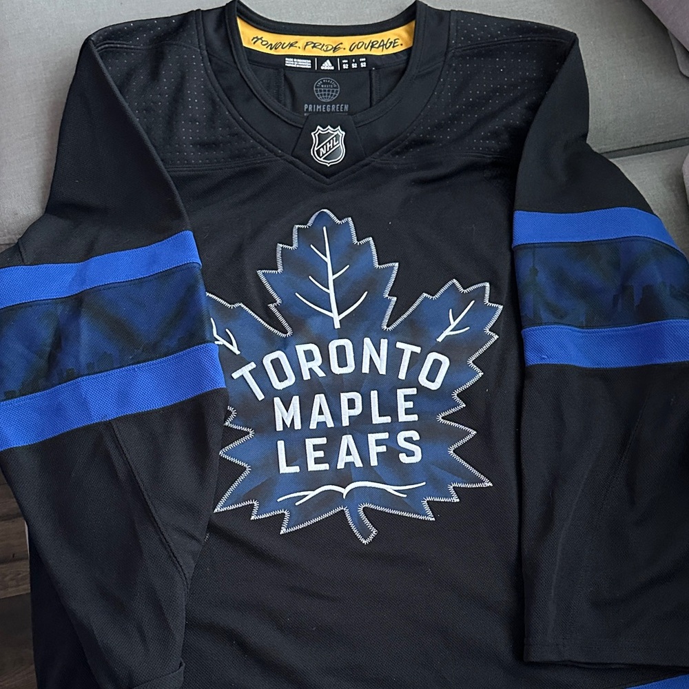 Drew reversible Black and Gold NHL Hockey Jersey with 'Honour. Pride. Courage.'